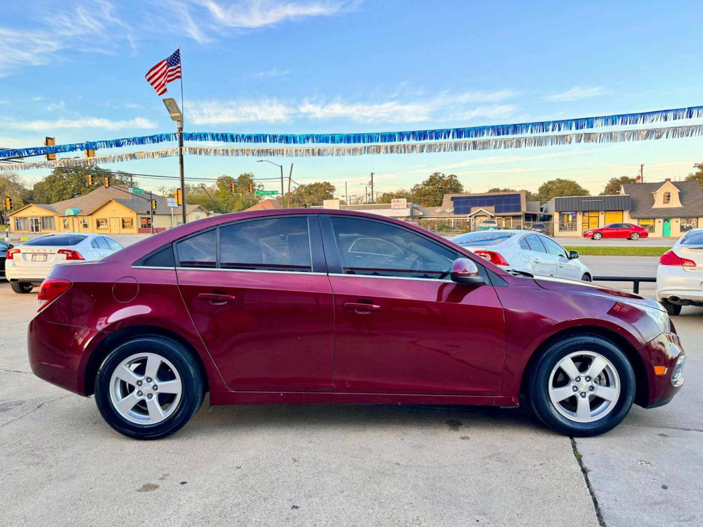 2016 RED /Gray CHEVROLET CRUZE LIMITED 1LT 1LT Auto 4dr Sedan w/1SD (1G1PE5SB1G7) with an 1.4L I4 Turbocharger engine, Automatic 6-Speed transmission, located at 5900 E. Lancaster Ave., Fort Worth, TX, 76112, (817) 457-5456, 0.000000, 0.000000 - This is a 2016 Chevrolet Cruze Limited 1LT Auto 4dr Sedan w/1SD that is in excellent condition. There are no dents or scratches. The interior is clean with no rips or tears or stains. All power windows, door locks and seats. Ice cold AC for those hot Texas summer days. It is equipped with a CD playe - Photo#7